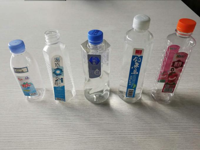 Kaksi automaattista tarratarrakoneen kaksipuolista tarrainta 6000-8000 B / H