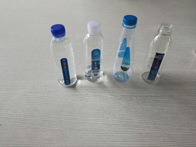 Muovipullojen etiketöintikone, juomavettä kivennäisvesipullojen etiketöintikone